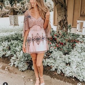 Frock and frill beaded dress